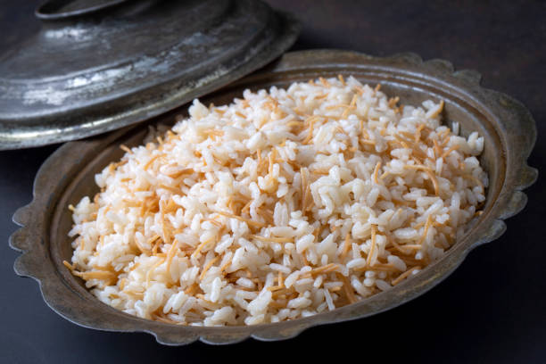 Traditional delicious Turkish food; Turkish style rice pilaf (Turkish name; Tel sehriyeli pirinc pilavi) Traditional delicious Turkish food; Turkish style rice pilaf (Turkish name; Tel sehriyeli pirinc pilavi) pilau rice stock pictures, royalty-free photos & images