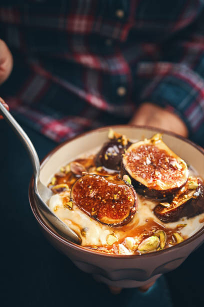 istock Healthy Yogurt with Caramelized Figs, Honey and Pistachio 1406057287