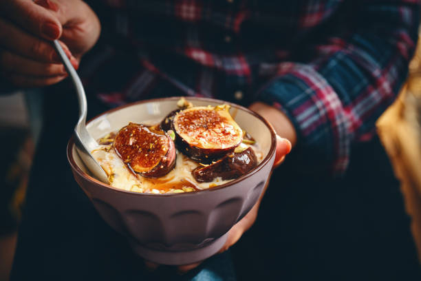 istock Healthy Yogurt with Caramelized Figs, Honey and Pistachio 1406057297