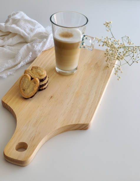 istock Latte macchiato coffee and palmiers biscuits with chocolate 1406060905