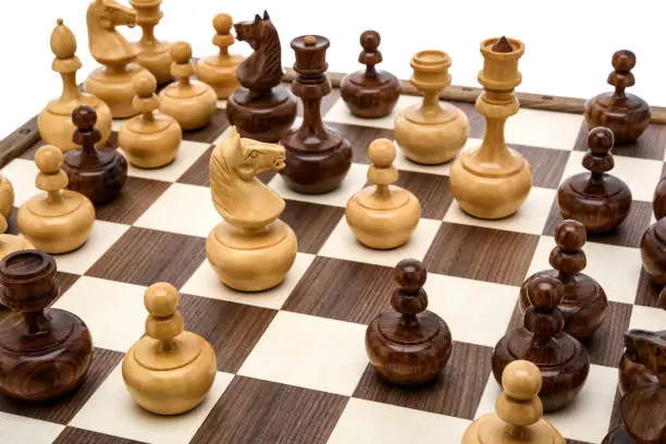 Photo of Beige Brown Wooden chess different pieces figures