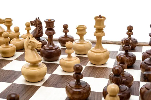 Photo of Beige Brown Wooden chess different pieces figures