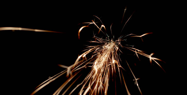 istock sparks in the dark. lines of light. 1406067066