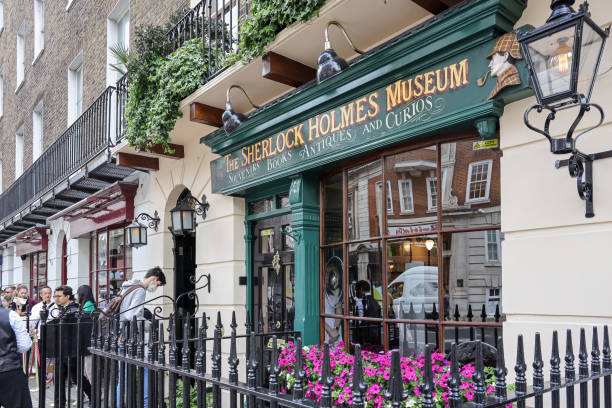 London,UK- June 28, 2022:  People queuing  in front of the Sherlock Holmes Museum. The Sherlock Holmes Museum is a privately run museum in London, England, dedicated to the famous fictional detective Sherlock Holmes.