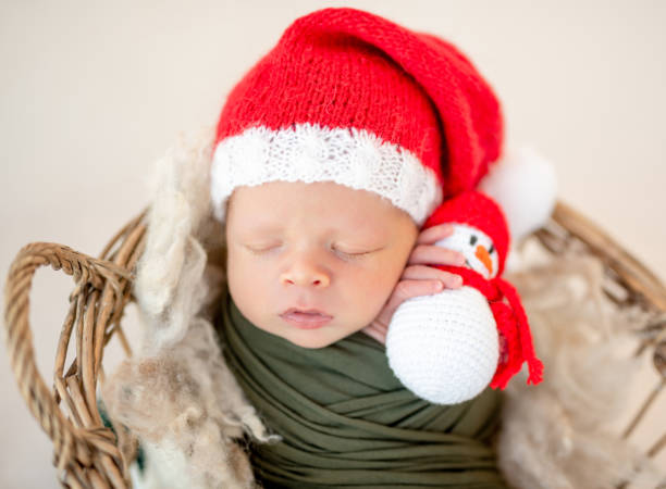 istock Lovely newborn in santa hat 1406075228