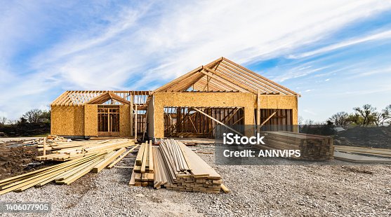 istock New house building at the construction site. 1406077905