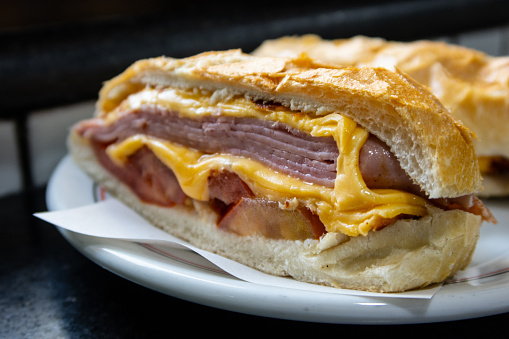 Traditional sandwich from the state of São Paulo, Brazil, made with common bread, cheese, ham and tomato.