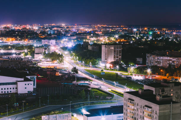 istock night city on long exposure. Traces from car headlights 1406084336