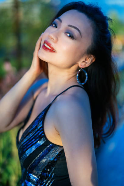 Fashion shots of a beautiful Asian woman taken at sunset