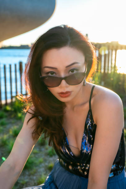 istock Beautiful Woman At Sunset 1406084979