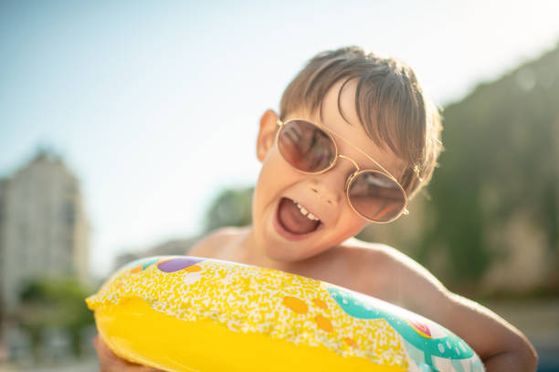 Excited little boy having fun on vacations