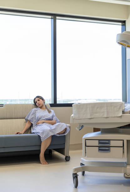 istock New mother sits in the empty hospital room 1406085131