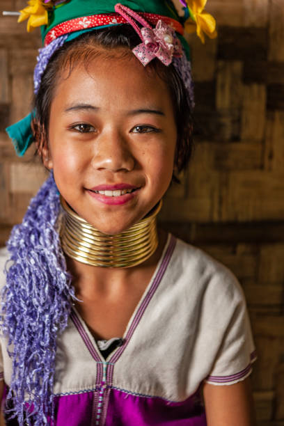 Portrait of little girl from Long Neck Karen Tribe Portrait of a long-neck little girl Padaung (Karen) tribe, Northern Thailand. padaung tribe stock pictures, royalty-free photos & images