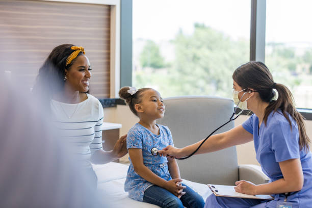 istock Cardiologist checks her young patients heart 1406085350
