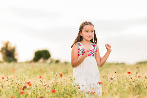 istock hispanic girl doing a viral dance for social network mobile smartphone application. lifestyle 1406085499