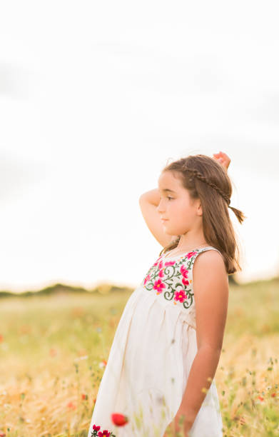 istock hispanic girl doing a viral dance for social network mobile smartphone application. lifestyle 1406086330