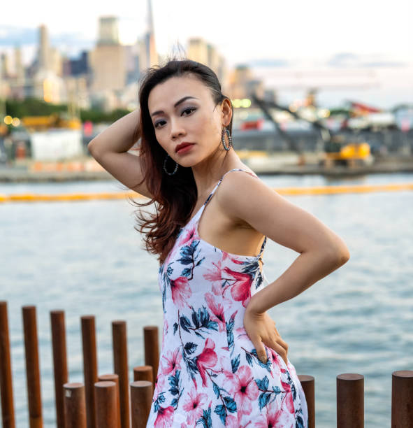 istock Beautiful Woman At Sunset 1406087292