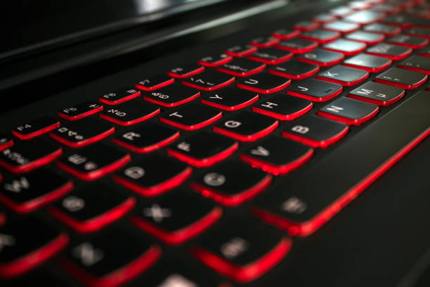 istock Close-up of laptop keyboard illumination, backlit keyboard 1406089083