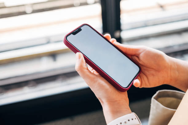 istock Anonymous Woman Using her Smartphone to Check her Social Media 1406094735