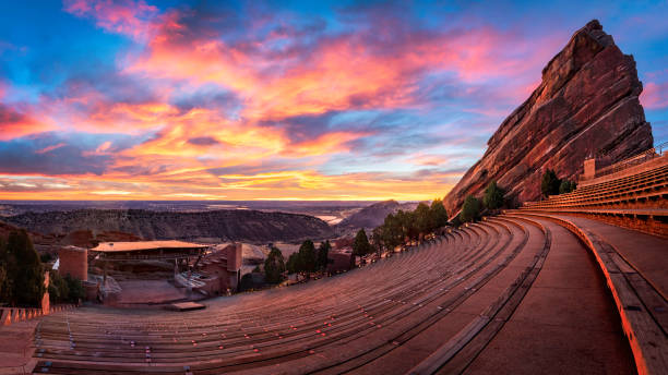 Red Rocks Amphitheater at Sunrise Red Rocks Amphitheater at Sunrise, near Denver Colorado amphitheater stock pictures, royalty-free photos & images