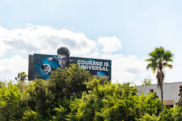 Orlando, USA - October 19, 2021: The Wizarding World of Harry Potter billboard in Florida for Universal Studios themed amusement attraction park with roller coaster rides