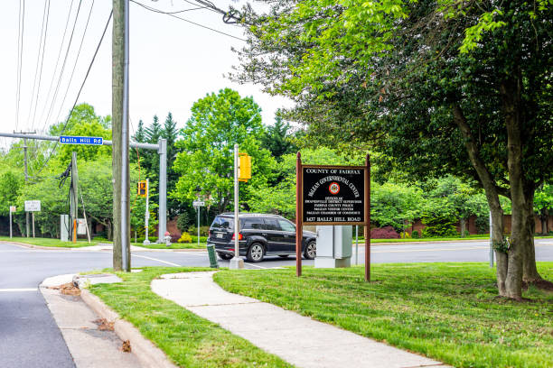 Sign at road street for county of Fairfax McLean Governmental Center in city town of Herndon in Northern Virginia Herndon, USA - April 28, 2019: Sign at road street for county of Fairfax McLean Governmental Center in city town of Herndon in Northern Virginia suburbs near Washington DC herndon virginia stock pictures, royalty-free photos & images