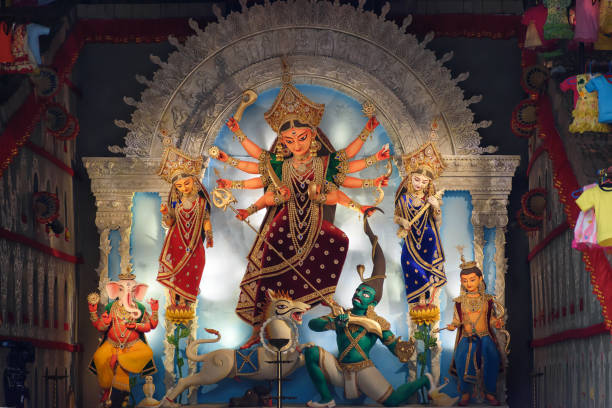 istock Goddess Durga devi idol decorated at puja pandal in Kolkata, West Bengal, India. Durga Puja is biggest religious festival of Hinduism and is now celebrated worldwide. 1406114002