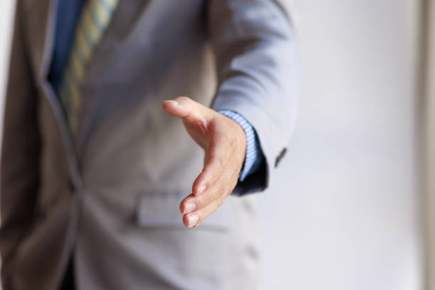 Business handshake for teamwork of business merger and acquisition,successful negotiate,hand shake,two businessman shake hand with partner to celebration partnership and business deal concept apretón de manos de negocios para el trabajo en equipo de fusión y adquisición de negocios, negociación exitosa, apretón de manos, dos empresarios estrechan la mano con el socio para celebrar la asociación y el concepto de acuerdo comercial