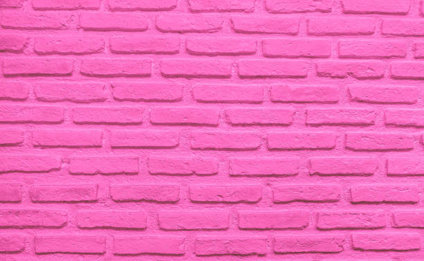 istock Abstract weathered texture stained old stucco light clean color and aged paint concrete pink brick wall background 1406120451