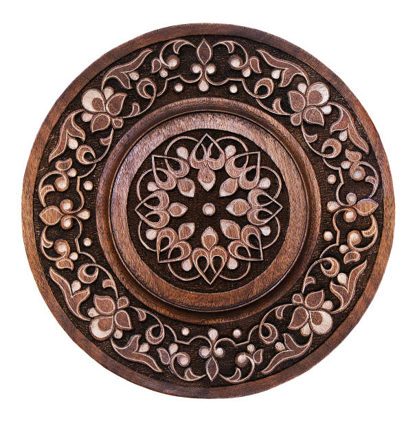 istock Arabic carved ornament on wooden plate, patterns. Souvenir plate. 1406124704
