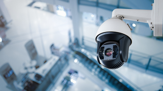 CCTV on Shopping mall or supermarket on blurry background.