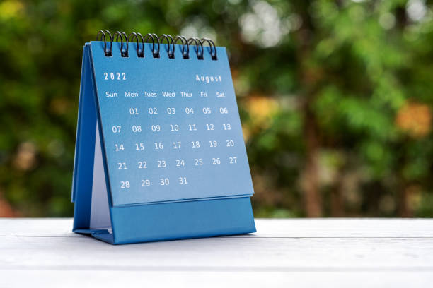 istock 2022 August blue colored desk calendar with copy space 1406127350