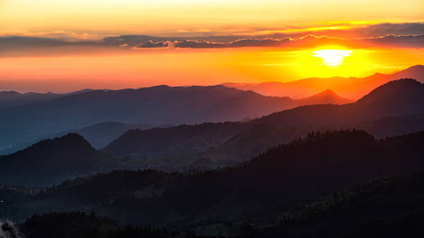 istock Sunset from the Prislop Pass, Rodna (Rodnei) Mountains, Carpathians, Romania. 1406132105