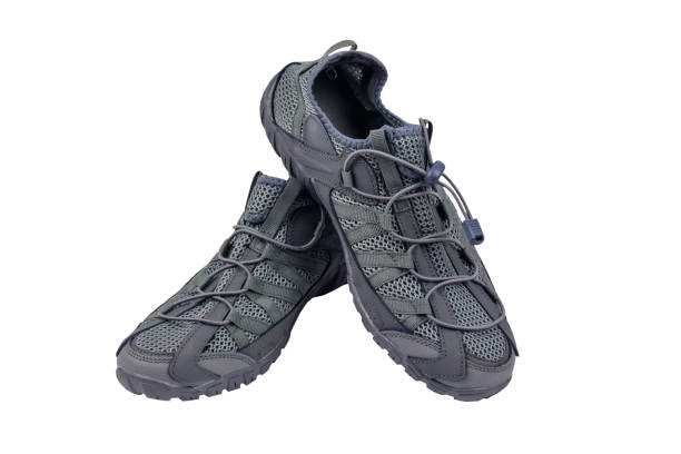 istock Gray male mesh sneakers isolated on white background 1406135007