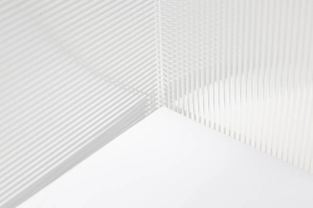 istock Stripe texture acrylic sheet. Clear linear prismatic panel, extruded linear ribs acrylic sheet. Abstract minimal graphic design resource.Close up of clear transparent plexiglass. 1406135012