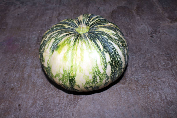 istock a big pumpkin isolated on stone background 1406136799