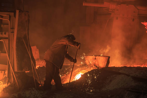 istock Man works in blast furnace area workshop. 1406137990