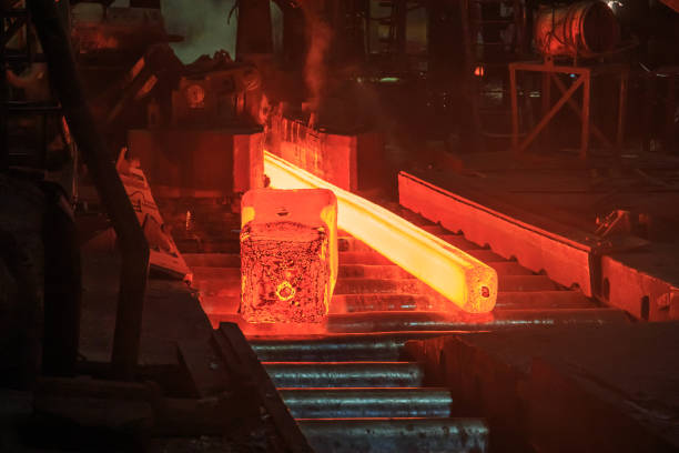 istock Hot red steel slabs in iron foundry workshop. 1406138021