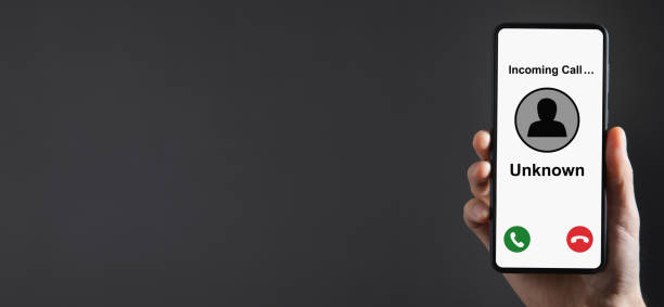 istock Man showing mobile phone with incoming call from unknown caller. 1406138083