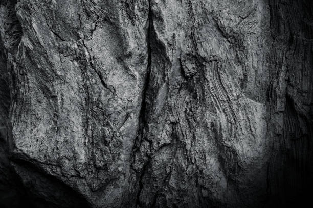 istock Natural dark gray or light black stone texture with detail patterns for background 1406141310