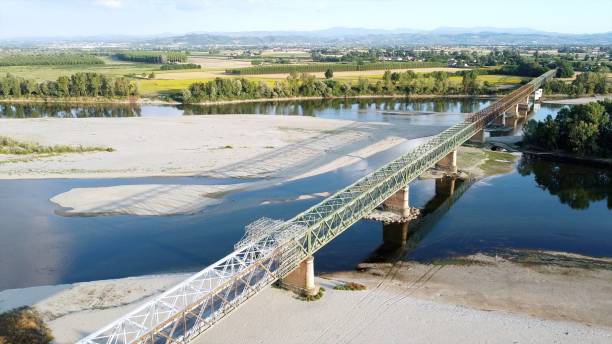 Italy -  drought and aridity in the almost waterless Po river with large expanses of sand and no water - climate change and global warming, Drone view in Ponte bella Becca Pavia Lombardy and Ticino Italy -  drought and aridity in the almost waterless Po river with large expanses of sand and no water - climate change and global warming, Drone view in Ponte bella Becca Pavia Lombardy and Ticino bottom the weaver stock pictures, royalty-free photos & images