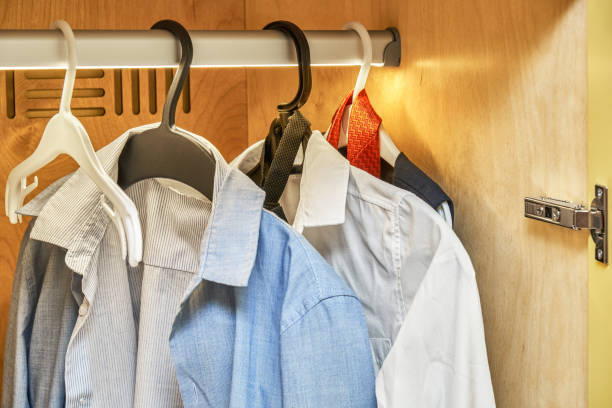 istock Children wardrobe with LED lighting and clothes on hangers 1406147640