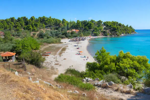 Photo of turquoise sea water bay in Greece