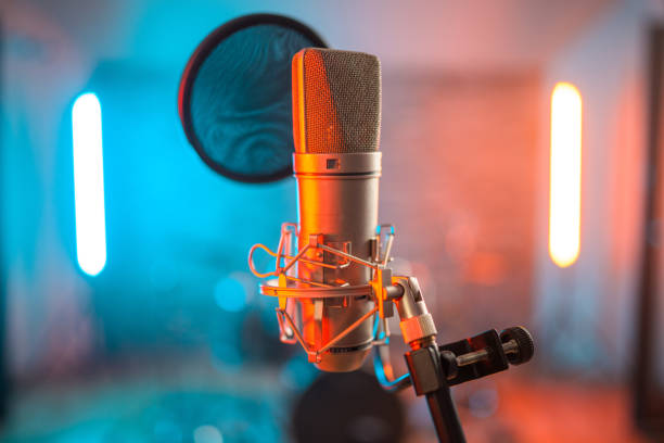 Studio Microphone in Empty Recording Studio stock photo