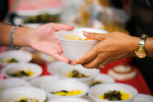 istock Blurred image of food distribution to the poor 1406156413