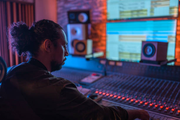 istock Man Operating With Sound Recording Studio Mixer 1406156731