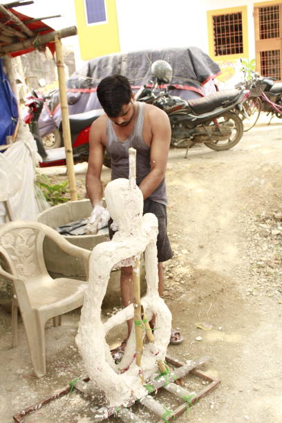 istock A Skilled Artisan Creates Plaster Modern Art Abstract Sculpture. 1406157699