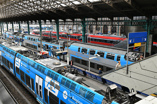 Berlin, Germany - November 9, 2019: Passengers moving through modern main railway station at Berlin Hauptbahnhof.