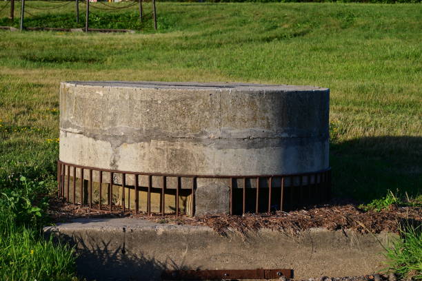istock large cement culvert drain surrounded by green grass 1406163115