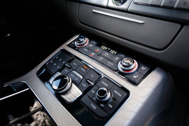 Close-up of the accelerator handle, radio, navigator and other setting buttons. stock photo